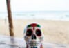 Mexico Travel Tips: Culture, Cuisine & Coastlines in One Trip "My messy plate of tacos meets Day of the Dead vibes on a Mexican beach."